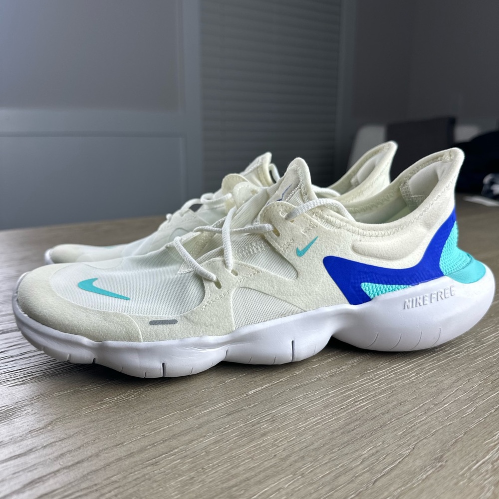 Nike Women's Free RN 5.0 running shoes in the "Sail/Aurora Green-Racer Blue"